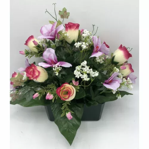Jardinière de fleurs artificielles fushia , mauve et rose clair dans un pot lestée pour cimetière