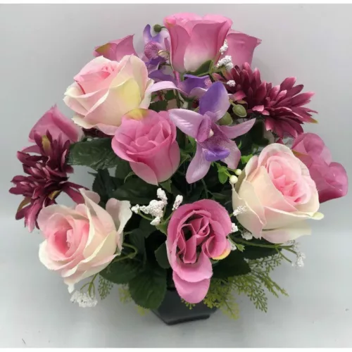 Coupe de fleurs artificielles fushia et rose dans un pot lestée pour cimetière