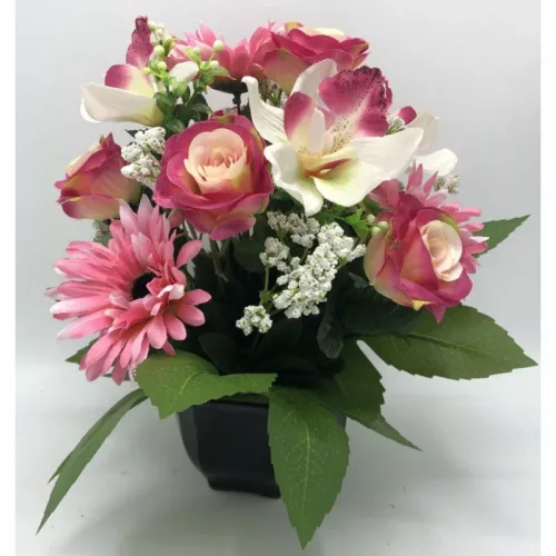 Coupe de fleurs artificielles rose dans un pot lestée pour cimetière