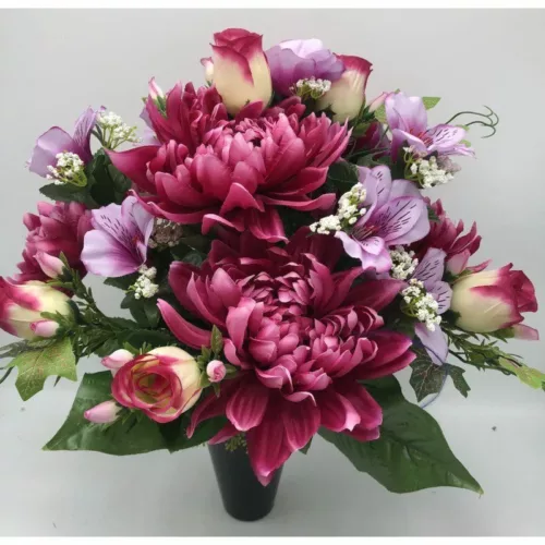 Cône de fleurs artificielles fushia et mauve dans un pot lestée pour cimetière