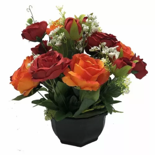Coupe de fleurs artificielles rouge et orange dans un pot lestée pour cimetière